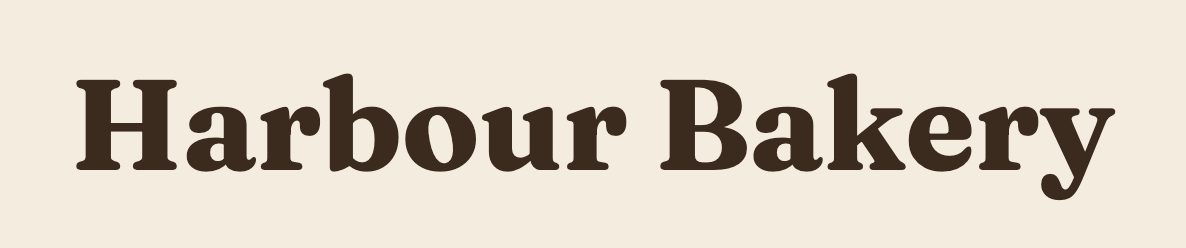 Sample: “Harbour Bakery” in a dark brown serif on cream
