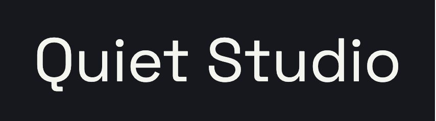Sample: “Quiet Studio” in a light sans serif on near-black